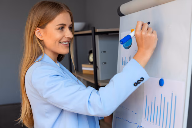 business person looking finance graphs 23 2150461334